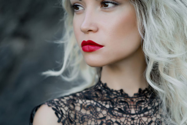 red lipstick blond haired makeup artist portfolio photo