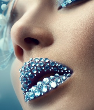 Woman wearing rhinestones on her lips