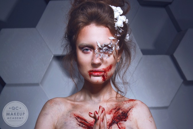 actress covered in special effects makeup wounds