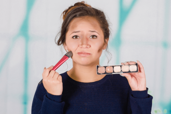 confused girl incorrectly applying contour