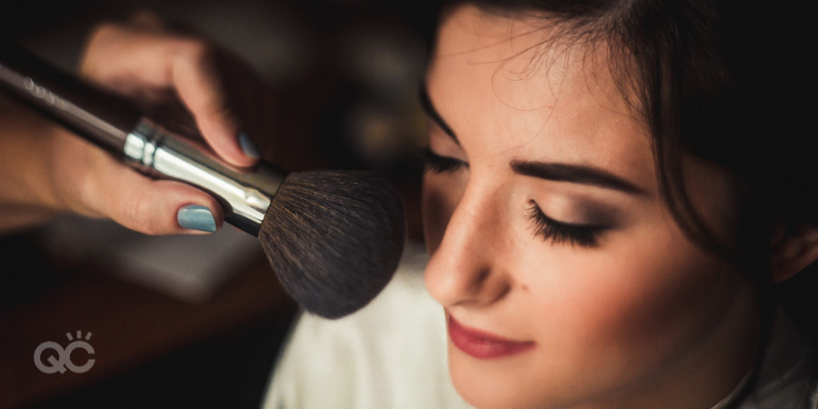 makeup artist applying makeup