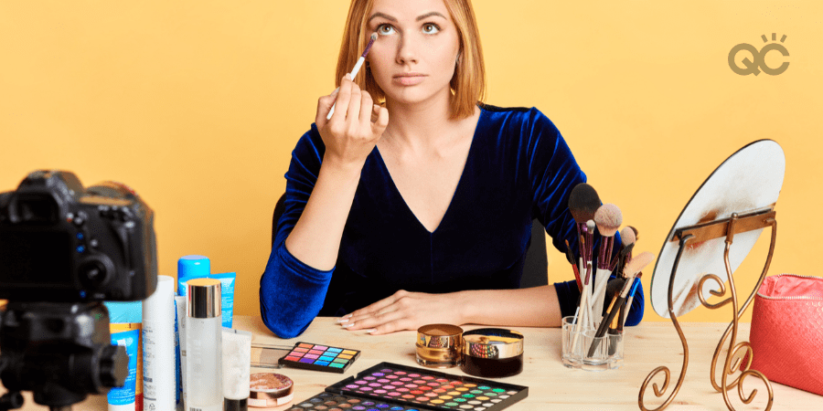 beauty vlogger filming makeup tutorial