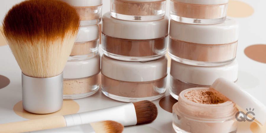 cosmetic brushes, make-up powder, blush, foundation, eyeshadow in plastic jars