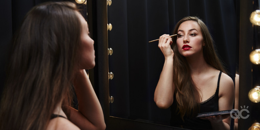 Makeup Looks to avoid on Valentines - Woman Applying Eye Makeup