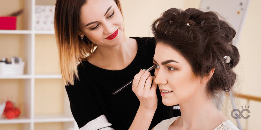 Makeup artist applying eye makeup: How to become a makeup artist as a stay-at-home mom article