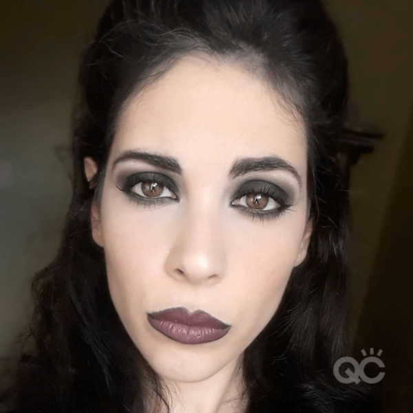 qc ambassador nadia calabro - demonstrating a bold smoky eye makeup look