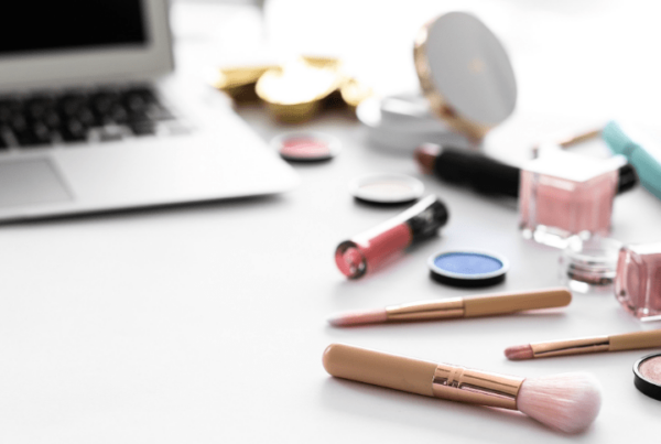 makeup products and laptop for online makeup schools