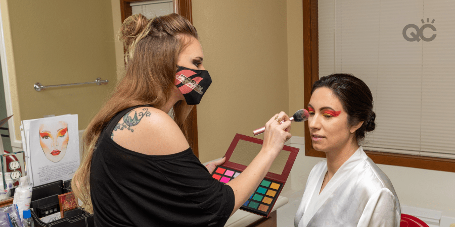 QC Makeup Academy Ambassador, Angelica Hamlin, applying makeup to model