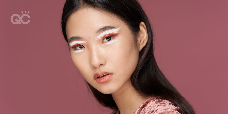 Beautiful Asian woman with bold, dramatic eye makeup, makeup trends